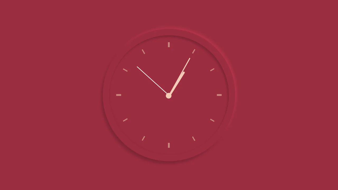 Sleek crimson neumorphic analog clock face with springy ticking hand animations synced to local system time.